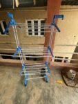 Three-layer clothes drying rack