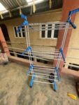Three-layer clothes drying rack