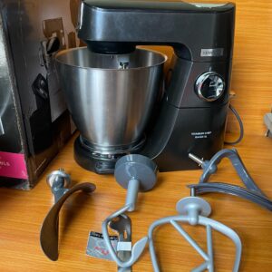 Kenwood Titanium Chef Baker XL stand mixer with its attachments. 